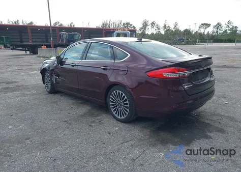 2017 Ford Fusion Hybrid Platinum z USA, uszkodzony, nr VIN 3FA6P0RU0HR309626